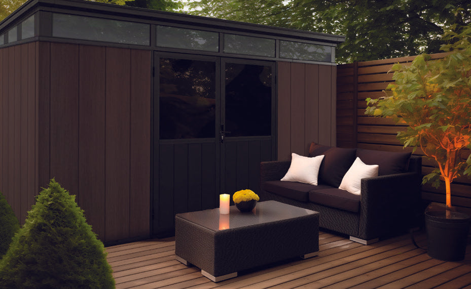 Mirage dark brown composite shed w panoramic windows nestled in back yard living space