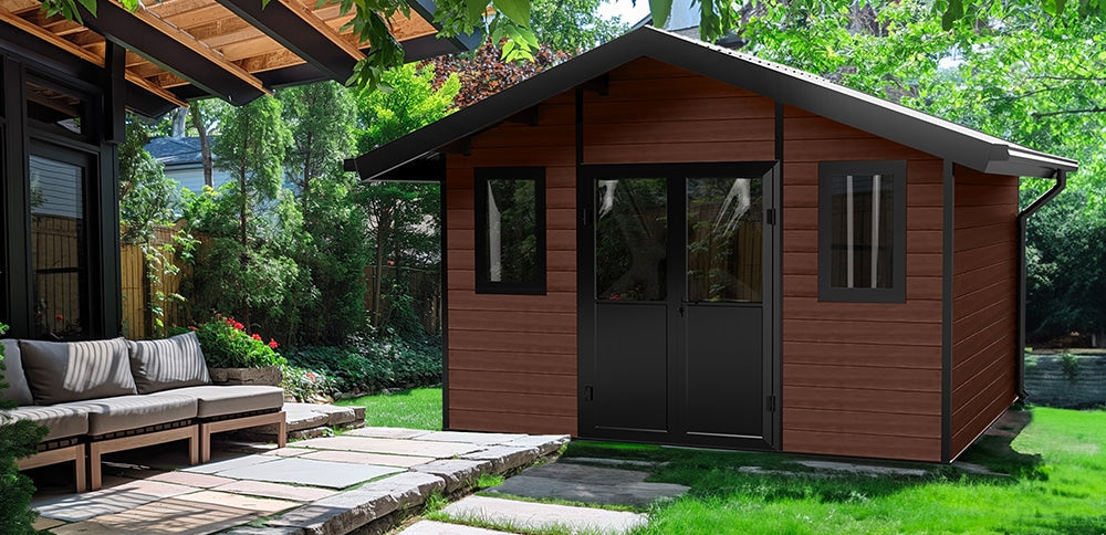 Modern composite shed with a stone pathway leading to it, surrounded by greenery.