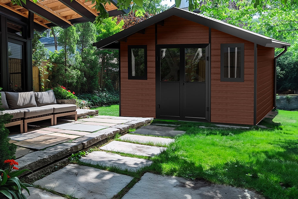 Modern composite shed with a stone pathway leading to it, surrounded by greenery.
